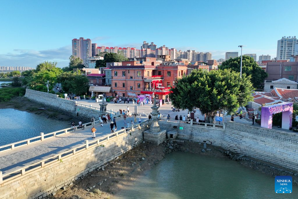 An aerial drone photo shows a view of the Qiaonan ancient street in Quanzhou City, southeast China's Fujian Province, Aug. 18, 2026. Qiaonan ancient street in Quanzhou is a historical and cultural block which still preserves traditional Minnan buildings and overseas-Chinese mansions. Minnan literally means southern Fujian Province. In recent years, local government has promoted the protection and utility of this block by rolling out innovative management mode. (Xinhua/Lin Shanchuan)