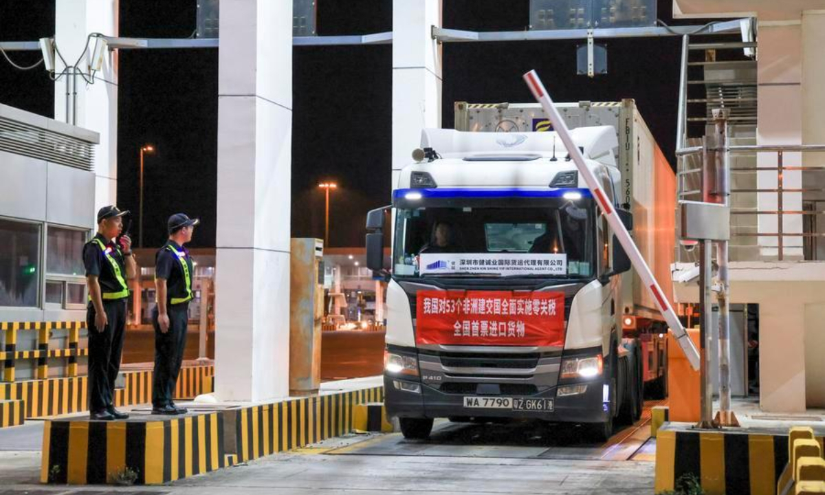 A container truck, transporting the first batch of imports under China's expanded zero-tariff treatment to 53 African nations, enters Shenzhenwan Port in Shenzhen, south China's Guangdong Province, May 1, 2026. (Xinhua/Mao Siqian)