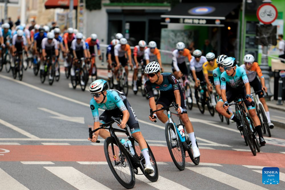 Cyclists compete during the last stage of Tour of Romania cycling race in Bucharest, Romania, Sept. 13, 2026. (Photo by Cristian Cristel/Xinhua)