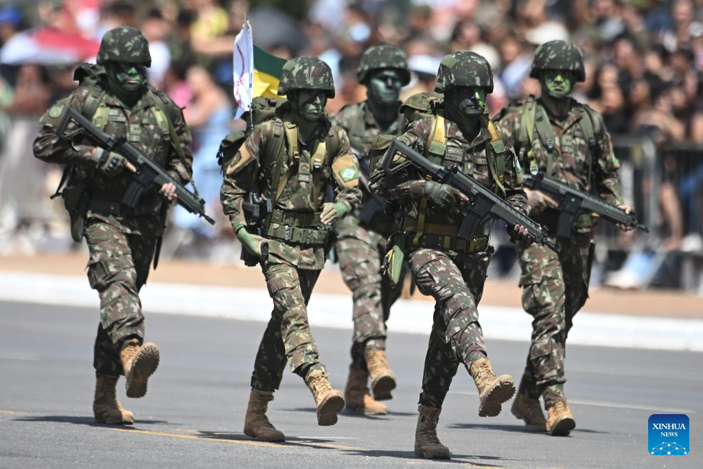 Army soldiers perform during the Soldier's Day ceremony in Brasilia, Brazil, on August 25, 2026. (Photo by Lucio Tavora/Xinhua)