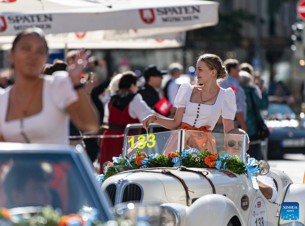 People participate in the Oktoberfest parade in Munich, Germany, Sept. 20, 2026. The 191st Oktoberfest, one of the largest folk festivals in Germany, opened on Saturday in Munich, and will last until Oct. 4. (Xinhua/Zhang Haofu)