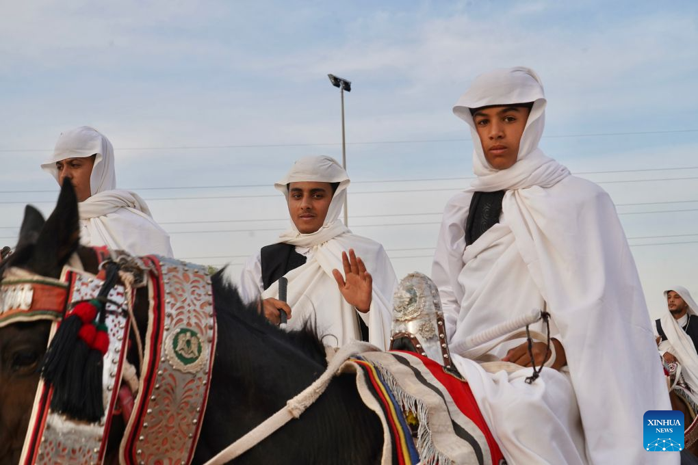 Riders take part in a traditional equestrian festival in Souq al-Khamis Amsihel, Libya, Oct. 7, 2026. (Photo by Hazem Turkia/Xinhua)