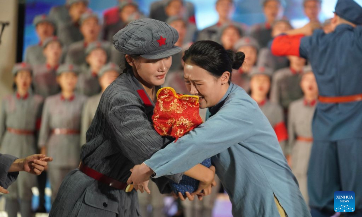 A short performance, titled Farewell, is staged before the Long March Origin choir's performance at a middle school in Yudu County, east China's Jiangxi Province, Sept. 3, 2026. (Xinhua/Zhou Mi)