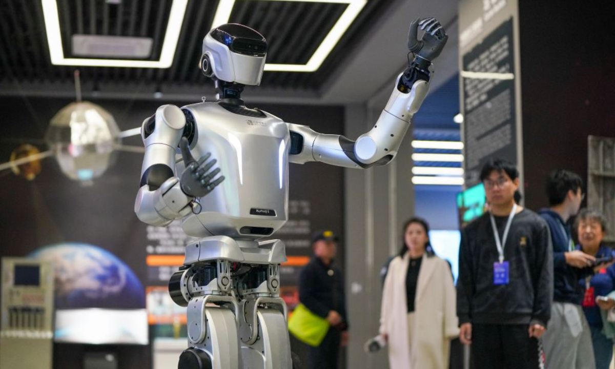 A humanoid robot serves as a guide for visitors at the Space Museum of Harbin Institute of Technology (HIT) in Harbin, northeast China's Heilongjiang Province, April 24, 2026. (Xinhua/Wang Song)