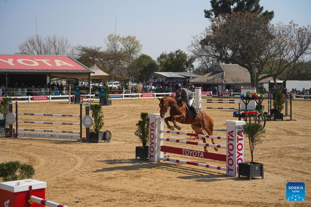 A rider competes during the Toyota SA Showjumping Champs 2026 in Johannesburg, South Africa, Aug. 9, 2026. The event was held from Aug. 5 to 9 at Kyalami Park Club in Johannesburg. (Xinhua/Chen Wei)
