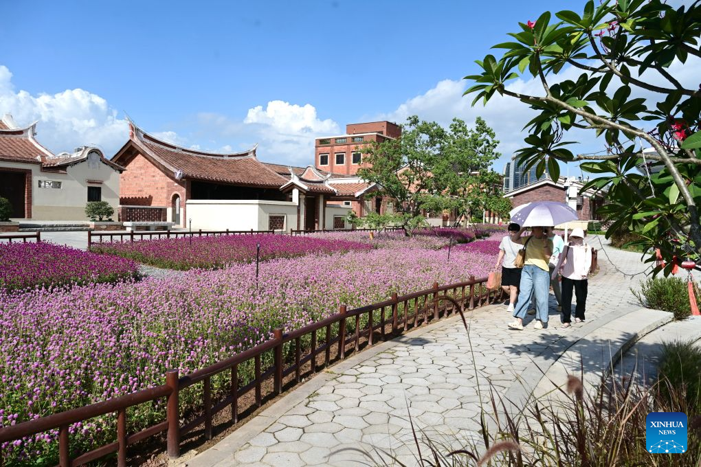 Tourists visit Longjiang Suiyue park in Zhangzhou, southeast China's Fujian Province, Aug. 19, 2026. Longjiang Suiyue park, a cultural and tourism complex, was transformed from an area with dilapidated buildings, widespread garbage, and wasted water. The renovated park officially opened on Dec. 31, 2024, and has attracted over 18 million visitors as of this June. (Xinhua/Lin Shanchuan)