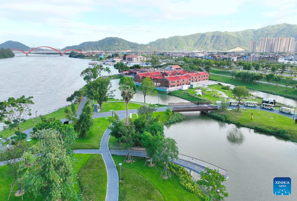 An aerial drone photo taken on Aug. 19, 2026 shows a view of Longjiang Suiyue park in Zhangzhou, southeast China's Fujian Province. Longjiang Suiyue park, a cultural and tourism complex, was transformed from an area with dilapidated buildings, widespread garbage, and wasted water. The renovated park officially opened on Dec. 31, 2024, and has attracted over 18 million visitors as of this June. (Xinhua/Lin Shanchuan)