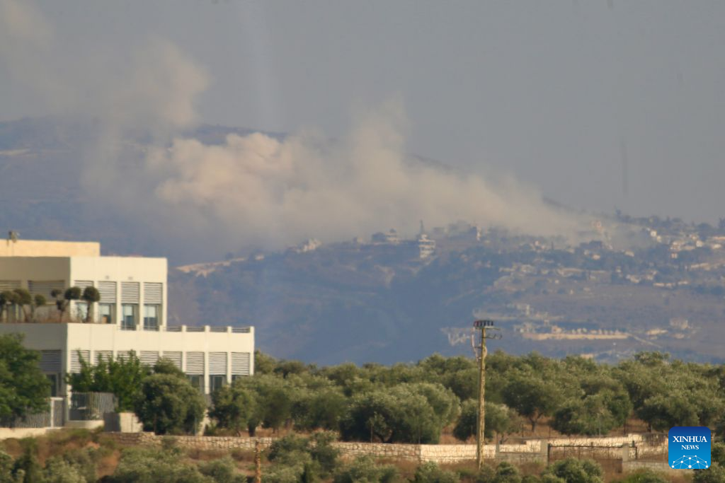 Photo taken on July 29, 2026 shows smoke rising from houses in Kfar Tebnit after Israeli army bombardments in Nabatieh, southern Lebanon. (Photo by Ali Hashisho/Xinhua)