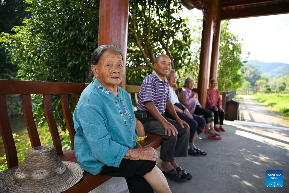 Residents rest at a pavilion in Xiacao Village in Ninghua County, southeast China's Fujian Province, Sept. 8, 2026. This year marks the 90th anniversary of the victory of the Long March by the Red Army under the leadership of the Communist Party of China (CPC). Ninghua is one of the starting points of the Long March by the Central Red Army. Xiacao Village in Ninghua has profound heritage of revolutionary history. (Xinhua/Zheng Huansong)