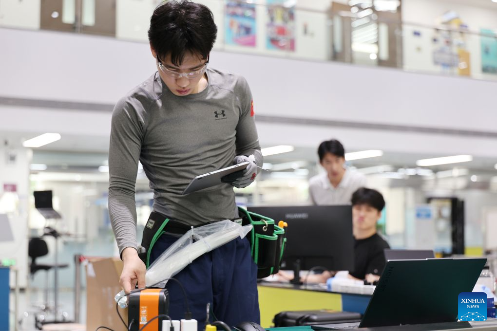 Liu Yuxuan prepares for the 48th WorldSkills Competition at a training base of Tianjin Electronic Information Technician College in Tianjin, north China, Sept. 2, 2026. (Xinhua/Li Ran)