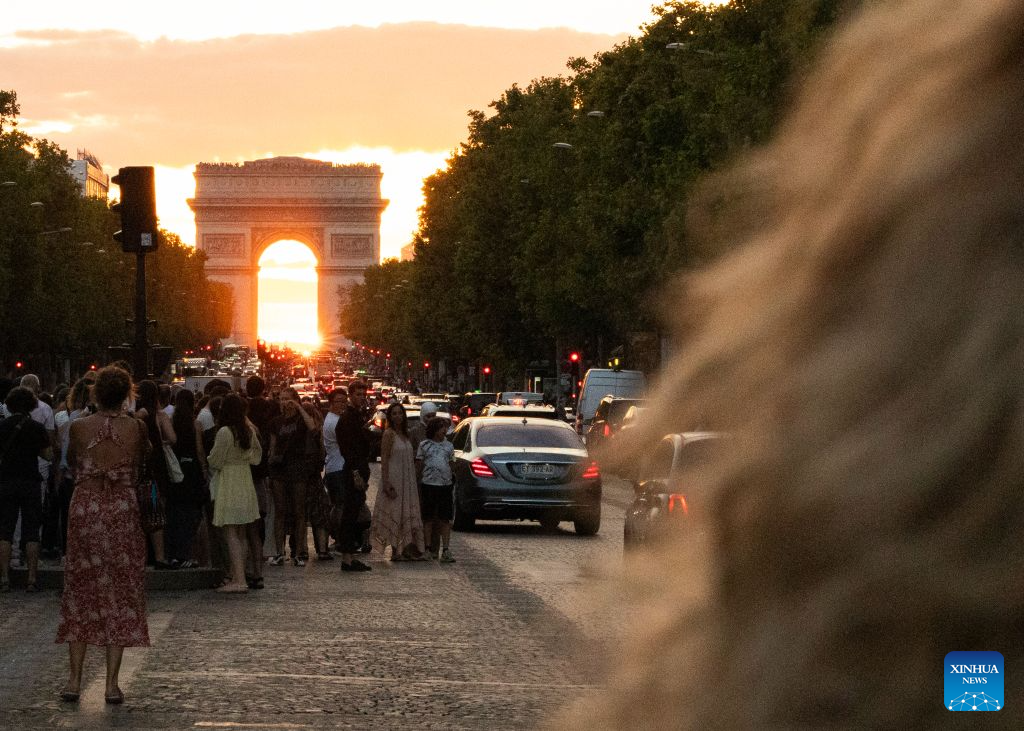 Photo taken on Aug. 3, 2026 shows a view of sunset in Champs-Elysees Avenue in Paris, France. (Xinhua/Wu Huiwo)