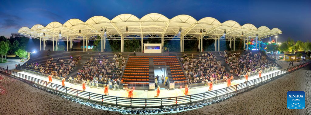 An aerial panoramic photo taken on May 31, 2026 shows foreign staff dancers performing for tourists at the Sendi Resort in Nantong, east China's Jiangsu Province. With their unique charm and outstanding dancing skills, foreign staff dancers have become an attractive part of the Sendi Resort in Nantong. After years of working and living here, they have gradually integrated into local life and fallen in love with the traditional Chinese culture. (Photo by Xu Congjun/Xinhua)