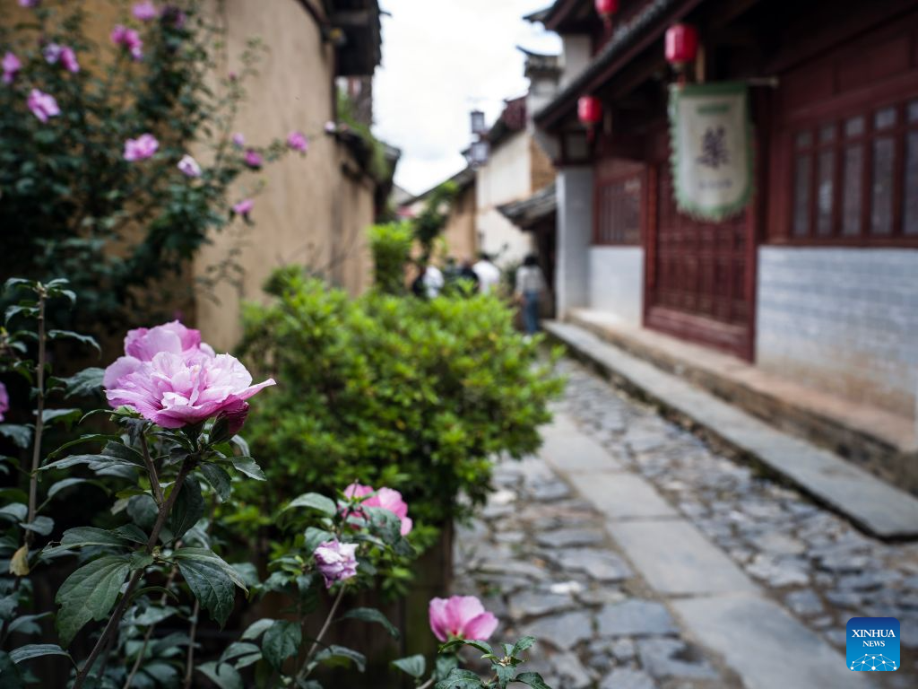 This photo taken on July 26, 2026 shows an alleyway view in Lushi ancient town in Fengqing County of Lincang City in southwest China's Yunnan Province. Lushi ancient town in the northeast of Fengqing County lies between the Lancang River and Heihui River. Due to its special geographical location, Lushi was once an important trading hub on the ancient Tea Horse Road, a trade route dating back to the Tang Dynasty (618-907). The town has formed an unique culture that is influenced by merchants coming and going as well as multi-ethnic cohabitation. (Photo by Lan Hongguang/Xinhua)