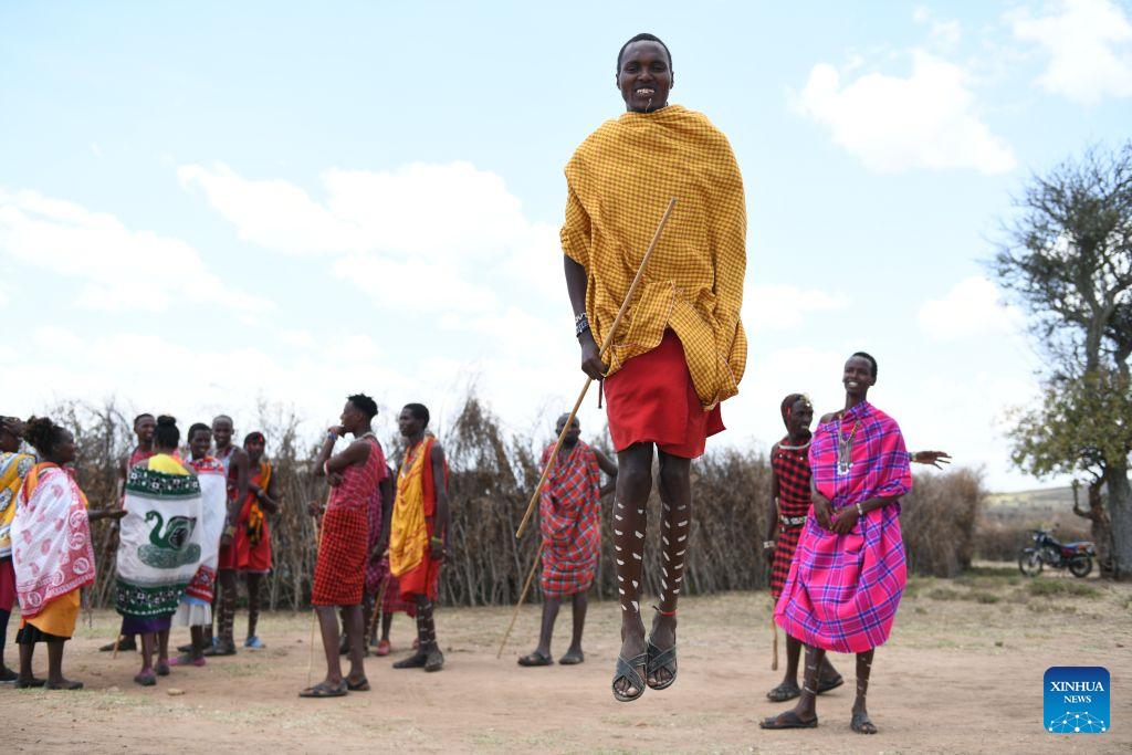Maasai villagers perform traditional dance at a village around the Maasai Mara National Reserve in Narok, Kenya, on Aug. 12, 2026.

The Maasai, one of the major tribes in Kenya, are still living a nomadic lifestyle. As local tourism develops, Maasai people have opened their villages to tourists to increase their income. (Xinhua/Liu Qiong)