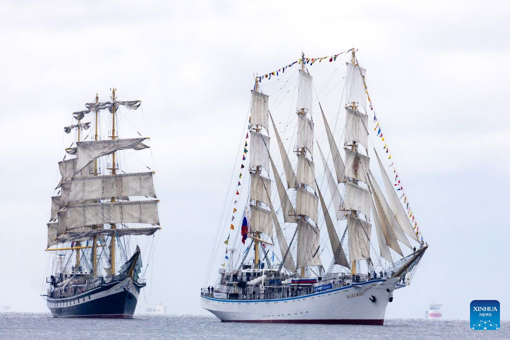 Sailboats are pictured during a parade of sails in Vladivostok, Russia, Sept. 1, 2026. A parade of sails was held during the 11th Eastern Economic Forum (EEF) on Tuesday, with more than 1,000 sailing enthusiasts participating. (Photo by Andrey Matveenko/Xinhua)