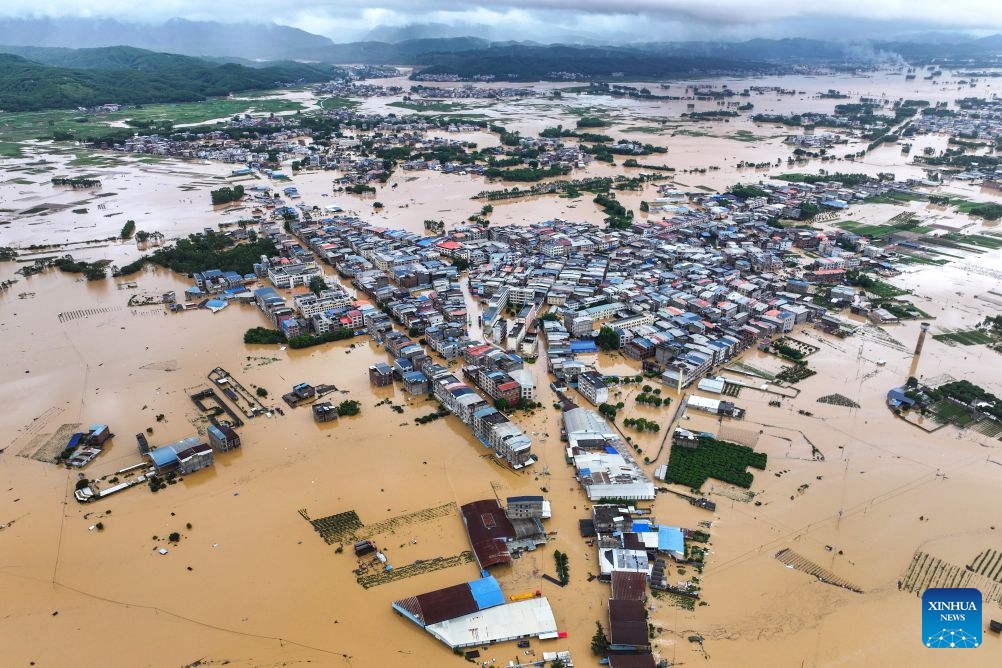 A drone photo taken on July 6, 2026 shows the flooded downstream areas of the Liulan Reservoir after it was breached due to heavy rains in Hengzhou, Nanning City, south China's Guangxi Zhuang Autonomous Region. Photo: Xinhua
