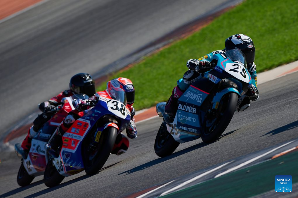CFMOTO Aspar's Sun Shengbo (R) of China competes during the Race 2 of the ESBK Talent category at the 2026 Spanish Superbike Championship Valencia in Valencia, Spain, Sept. 13, 2026. (Photo by Pablo Morano/Xinhua)