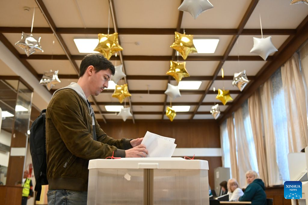A voter casts her ballot at a polling station in Moscow, Russia, on Sept. 20, 2026. Elections for deputies to the ninth convocation of the State Duma, the lower house of parliament, ran from Sept. 18 to 20. (Photo by Alexander Zemlianichenko Jr/Xinhua)