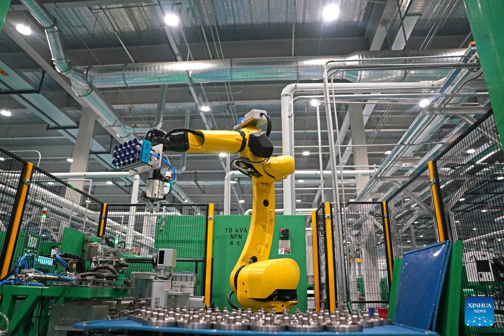 A robotic arm is at work at Highly Group's production base in Nanchang, east China's Jiangxi Province, Aug. 20, 2026. Smart, digitalized production has been fully realized at the Nanchang production base of electric appliance manufacturer Highly Group, a leading intelligent manufacturing base for air conditioner compressors. On average, the base produces a compressor every 6.5 seconds. Highly Group exports air conditioner compressors to 165 countries and regions worldwide, accounting for nearly one-seventh of the global market share. (Xinhua/Wan Xiang)