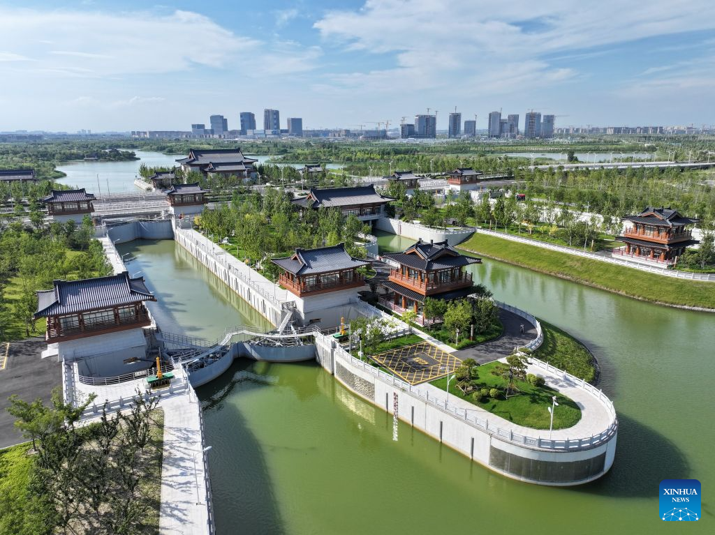 An aerial drone photo taken on Aug. 4, 2026 shows a view of the Nanhe water conservancy hub in Xiong'an New Area, north China's Hebei Province. The Nanhe water conservancy hub in Xiong'an New Area serves as a flood control barrier while also supporting sightseeing and tourism, ecological experiences and inland navigation. (Xinhua/Mu Yu)
