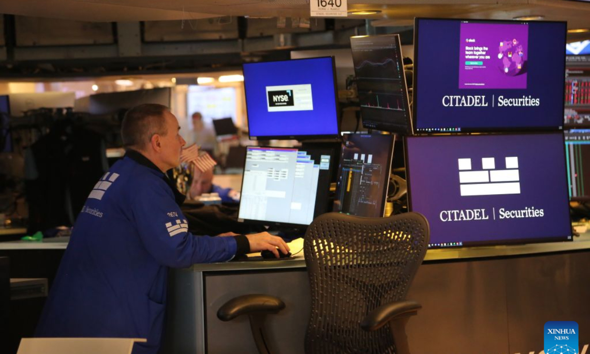 A trader works on the trading floor of the New York Stock Exchange in New York City, the United States, Oct. 7, 2026. U.S. stocks closed lower on Wednesday as benchmark Treasury yields touched multi-year highs. (Xinhua/Liu Yanan)