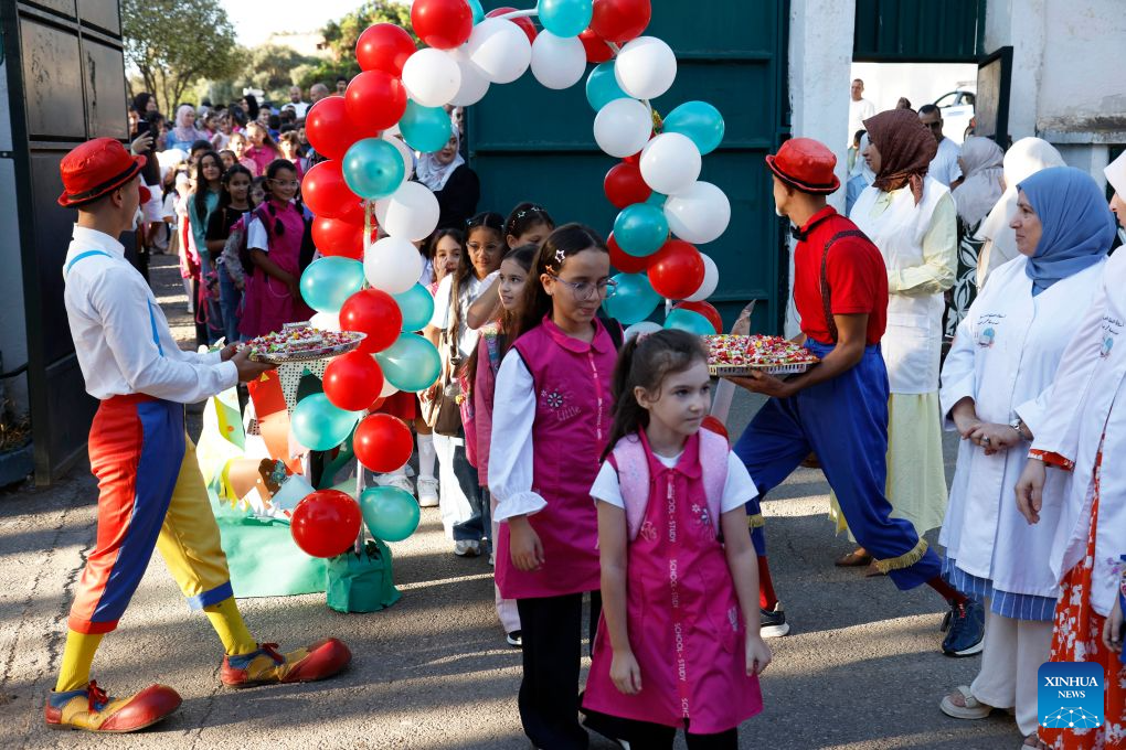 Students return to school in Algiers, Algeria, on Sept. 21, 2026. Nearly 12 million students in primary and middle schools across Algeria returned to school on Monday. (Photo by Billel Bensalem/Xinhua)