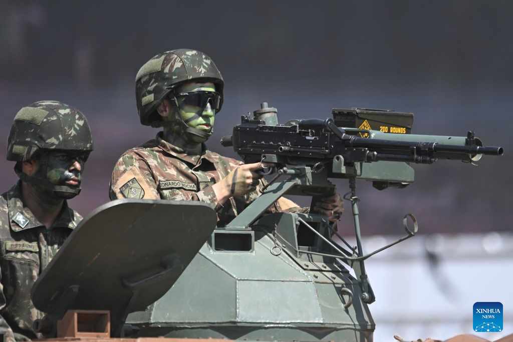 Army soldiers perform during the Soldier's Day ceremony in Brasilia, Brazil, on August 25, 2026. (Photo by Lucio Tavora/Xinhua)