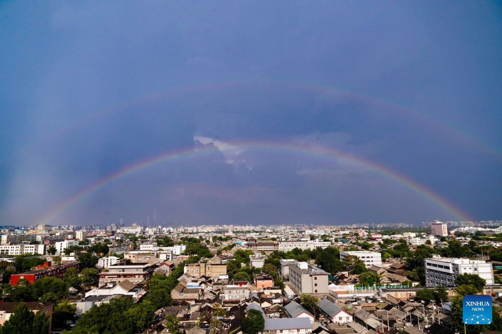 Rainbows appear in the sky after rain in Beijing, capital of China, Aug. 3, 2026. (Xinhua/Du Juanjuan)