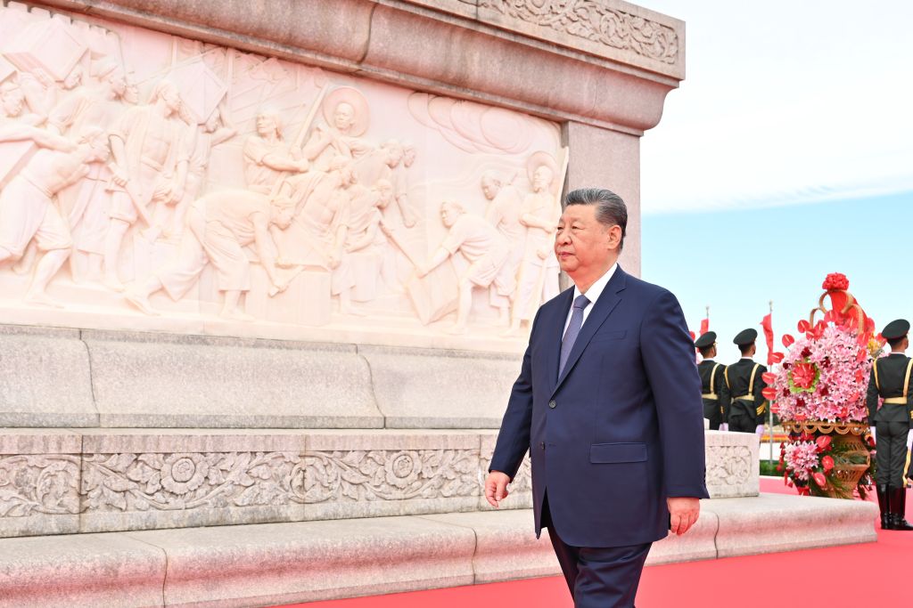 Chinese President Xi Jinping walks around the Monument to the People's Heroes to pay tribute during a ceremony to present flower baskets to fallen national heroes at Tian'anmen Square in Beijing, capital of China, Sept. 30, 2026. Xi Jinping and other leaders of the Communist Party of China and the state including Li Qiang, Zhao Leji, Wang Huning, Cai Qi, Ding Xuexiang, Li Xi and Han Zheng attended the ceremony on Wednesday. The event was held to mark Martyrs' Day. Observed on Sept. 30, one day before National Day, the day commemorates those who gave their lives for national independence and prosperity. (Xinhua/Yue Yuewei)
