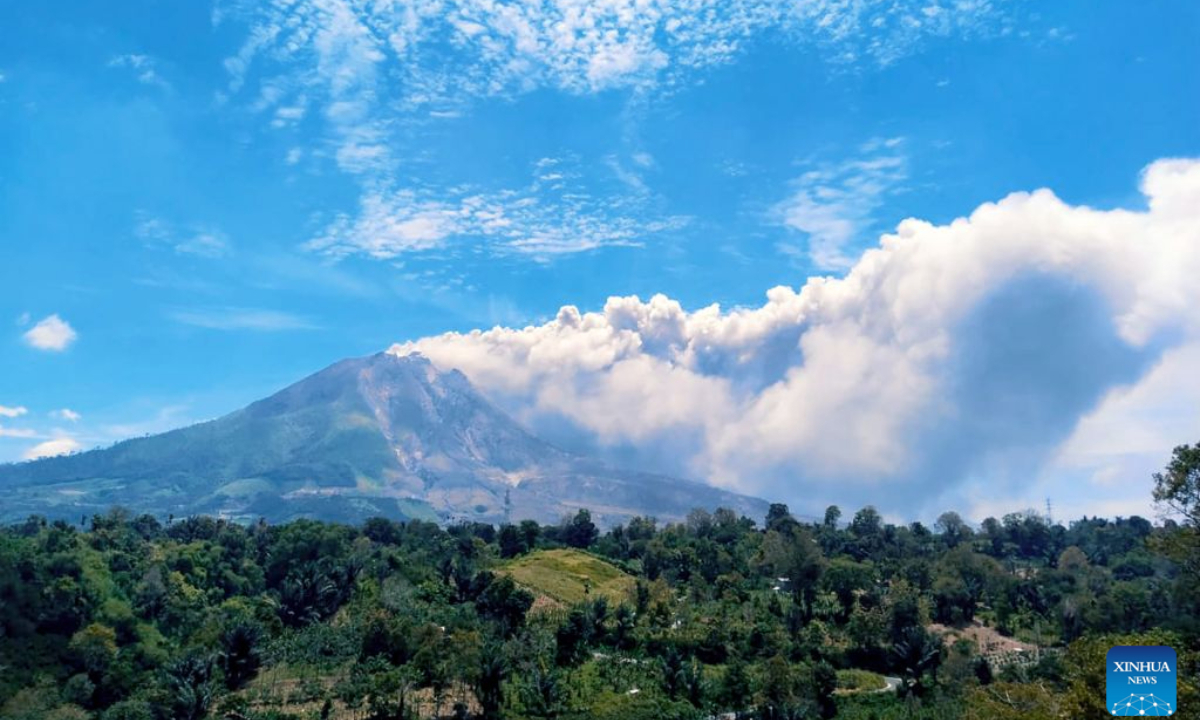 Volcanic materials are seen spewing from Mount Sinabung in North Sumatra Province, Indonesia, Aug. 31, 2026. Mount Sinabung in Indonesia's North Sumatra province erupted Monday morning, sending volcanic ash over the nearby city of Berastagi, a local monitoring official said. (Photo by Sarianto/Xinhua)