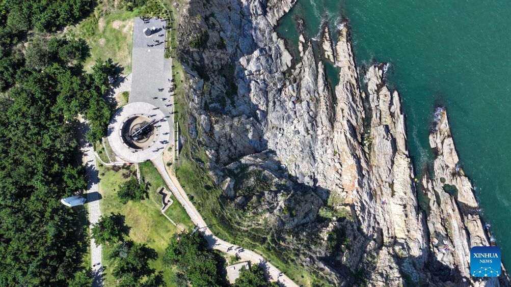 An aerial drone photo taken on Sept. 7, 2026 shows people visiting the Liugong Island in Weihai City, east China's Shandong Province. (Xinhua/Zhu Zheng)