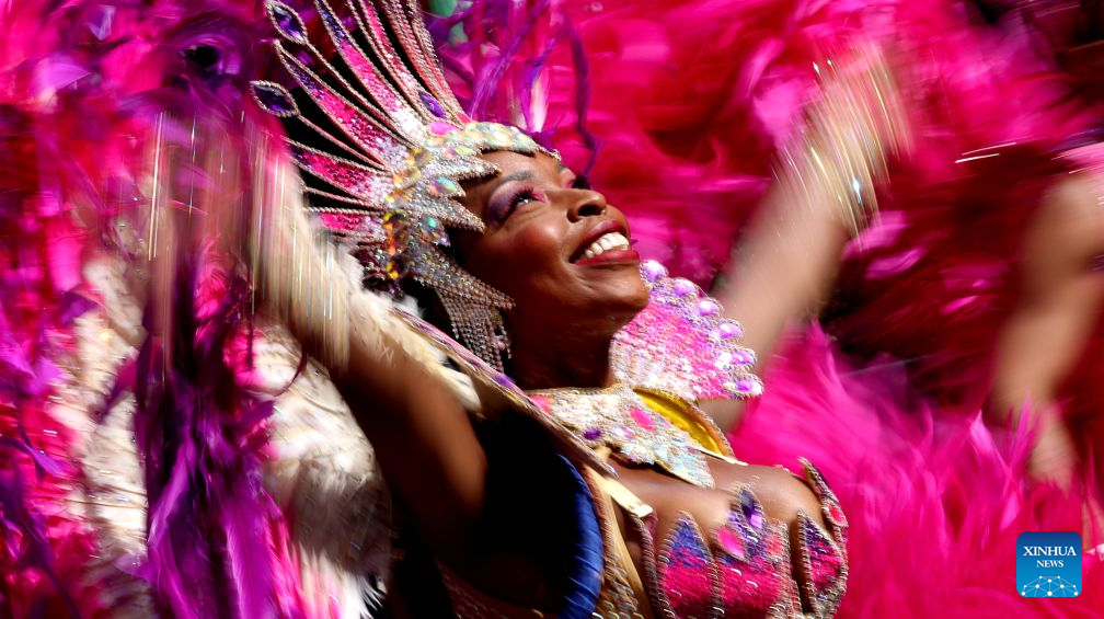 A performer participates in the Notting Hill Carnival in London, Britain, on Aug. 31, 2026. Originating in the 1960s, the carnival is a way for Afro-Caribbean communities to celebrate their cultures and traditions. (Xinhua/Li Ying)