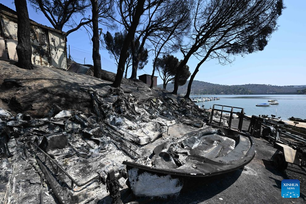 This photo taken on July 29, 2026 shows the aftermath of a fire in the Madrid region, Spain. Spanish Prime Minister Pedro Sanchez announced on Thursday the end of the national emergency declared over wildfires in the province of Avila and the Madrid region, as fires in the two areas have largely stabilized, while blazes remain active elsewhere amid a new heatwave and strong winds. (Xinhua/Cheng Min)