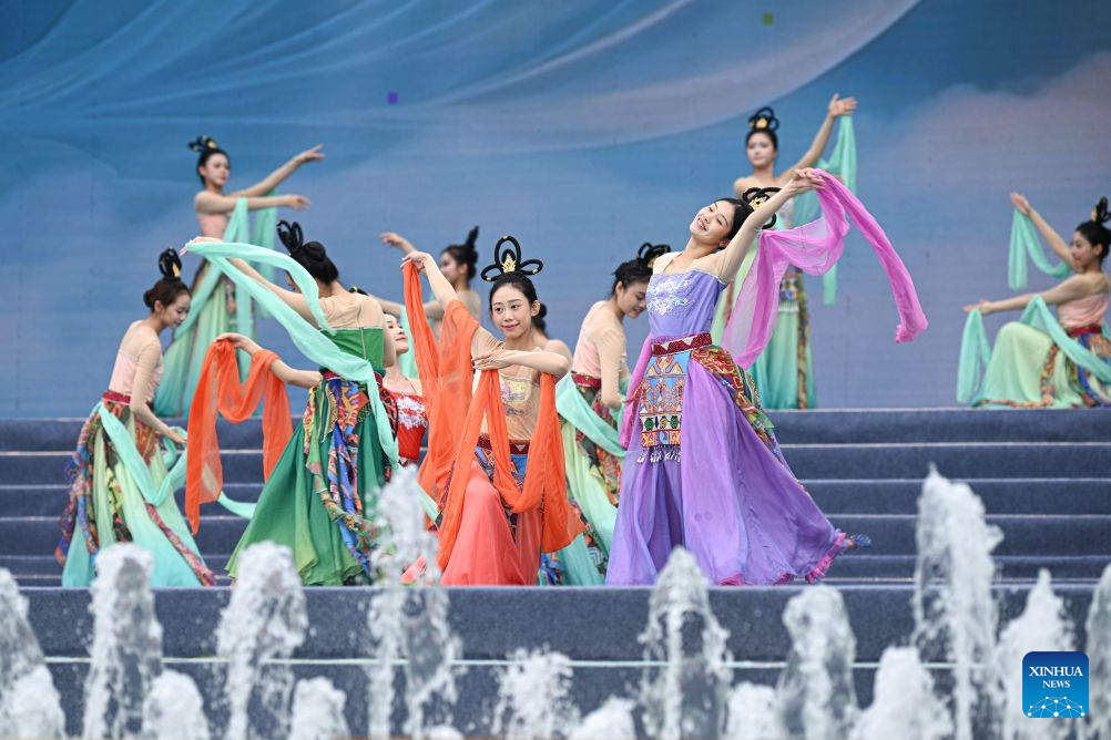 Dancers perform at the opening ceremony of a water festival held in Baoting Li and Miao Autonomous County, south China's Hainan Province, Aug. 19, 2026.
A water festival is held here on Wednesday, on the occasion of the Qixi Festival, the Chinese version of the Valentine's Day. (Xinhua/Pu Xiaoxu)