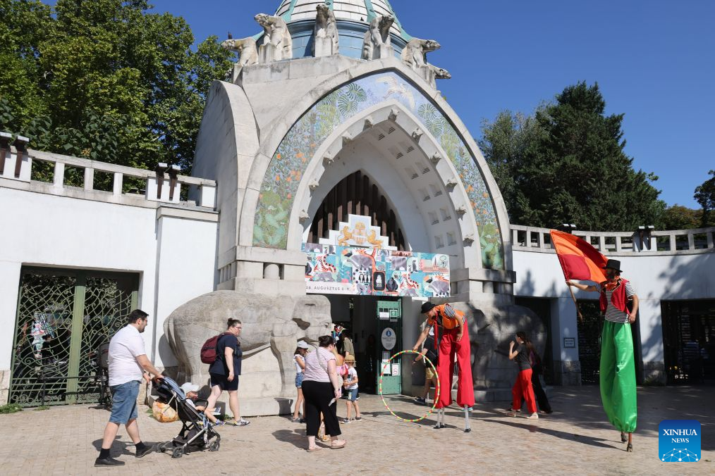 People come to visit the Budapest Zoo as it celebrates its 160th anniversary in Budapest, Hungary, on Aug. 9, 2026. (Photo by Attila Volgyi/Xinhua)