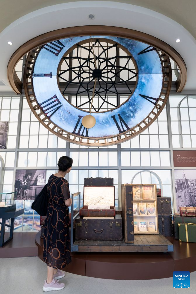 A woman visits Shanghai Literature Museum in Hongkou District, east China's Shanghai, Aug. 27, 2026. After years of preparation, the Shanghai Literature Museum, a comprehensive literary institution, officially opened to the public on Thursday, offering a concentrated showcase of the evolution and remarkable achievements of Shanghai literature.
The museum consists of a main building and three historic buildings, featuring five permanent exhibition zones that reveal the history and character of Shanghai literature from different perspectives. (Xinhua/Wang Xiang)