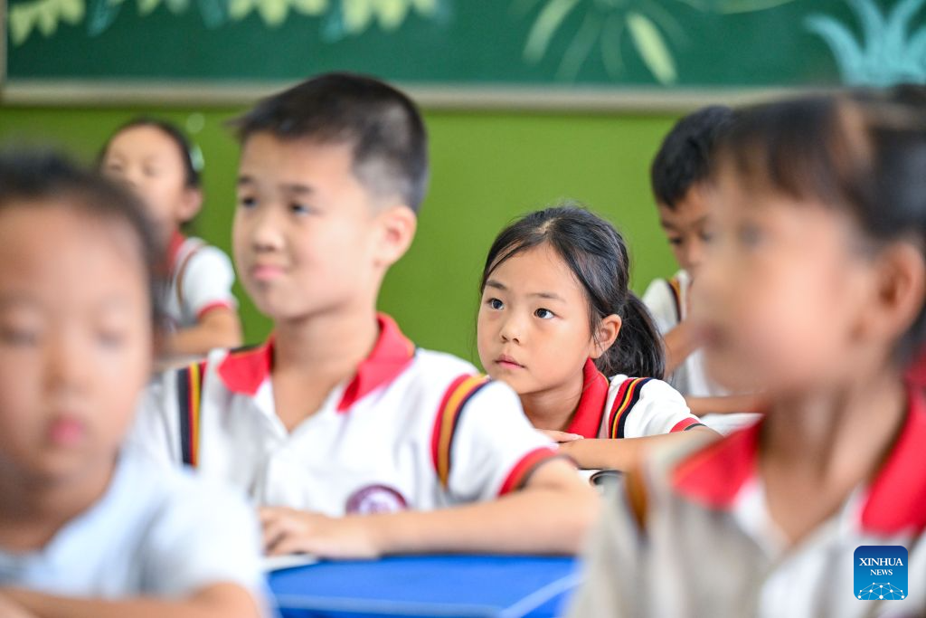 Students attend a class at a school in Liuhe New Village of Juancheng County in Heze, east China's Shandong Province, Sept. 16, 2026. The Yellow River, dubbed the Mother River of China, has long nourished the land in Heze, east China's Shandong Province, but recurring floods once posed a persistent threat to residents living on its floodplain. To protect local residents from flooding, a large-scale relocation and reconstruction project was launched in 2017 and completed in 2020.
Some 600,000 residents from the floodplain moved into newly built communities with improved housing and access to kindergartens, community clinics, elderly care centers and public spaces. In recent years, local authorities have also developed agriculture, rural processing and tourism-related industries to create more income opportunities for residents. (Xinhua/Chen Yehua)