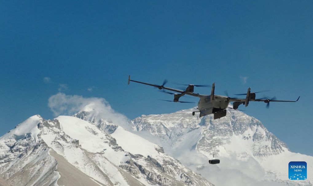 This photo shows DJI EV50, a latest vertical take-off and landing fixed-wing hybrid drone, working on the northern slope of Mount Qomolangma in southwest China's Xizang Autonomous Region, on May 21, 2026. A joint Chinese scientific expedition team has successfully measured vertical ozone distribution data from the ground up to an altitude of 8,861 meters above sea level in the Mount Qomolangma area. Using the latest vertical take-off and landing fixed-wing hybrid drone, the joint team from the Peking University (PKU) and Chinese Academy of Sciences also fully captured the entire process of downward ozone transport driven by glacier winds. These achievements have added a crucial piece of observational evidence to the study of high-concentration ozone and its changing trends over the Qinghai-Tibet Plateau in western China. (Xinhua)