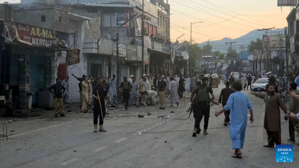 Photo taken with a mobile phone on Aug. 2, 2026 shows the blast site in Khyber Pakhtunkhwa province, Pakistan. The death toll from a suicide blast near a peace rally in Pakistan's northwestern Khyber Pakhtunkhwa province has risen to 14, while 26 others were injured, police sources told Xinhua on Sunday. (Str/Xinhua)