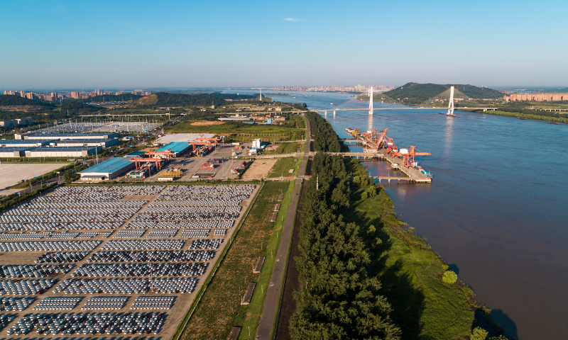 Newly produced vehicles fill a parking lot at a SAIC-GM industrial park in Wuhan, Central China's Hubei Province on July 10, 2022. Photo: VCG