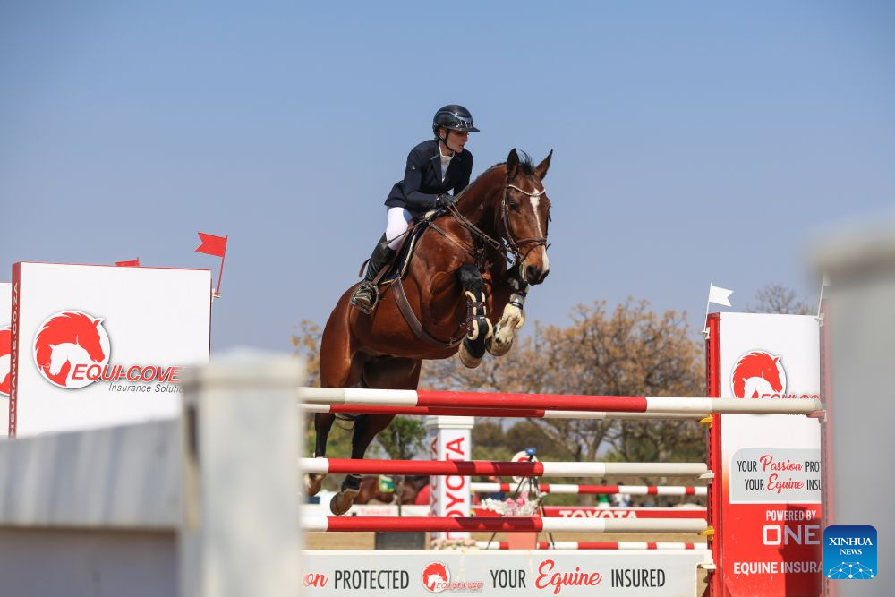 A rider competes during the Toyota SA Showjumping Champs 2026 in Johannesburg, South Africa, Aug. 9, 2026. The event was held from Aug. 5 to 9 at Kyalami Park Club in Johannesburg. (Xinhua/Chen Wei)