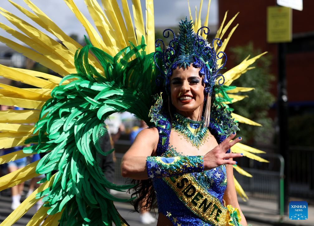 A performer participates in the Notting Hill Carnival in London, Britain, on Aug. 31, 2026. Originating in the 1960s, the carnival is a way for Afro-Caribbean communities to celebrate their cultures and traditions. (Xinhua/Li Ying)