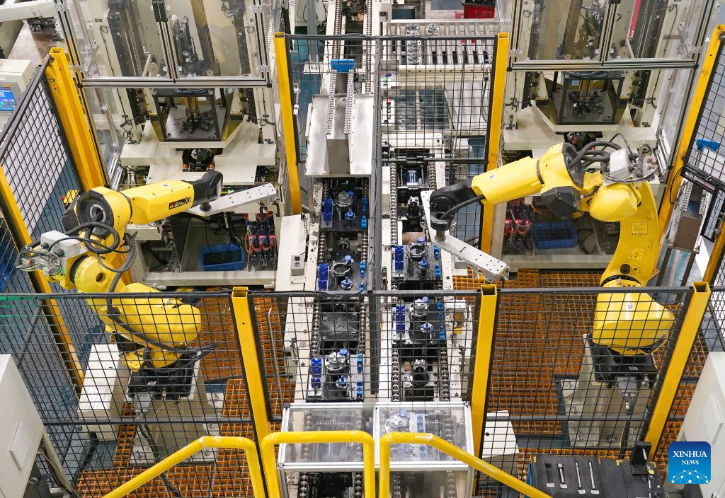 Robotic arms are at work at Highly Group's production base in Nanchang, east China's Jiangxi Province, Aug. 20, 2026. Smart, digitalized production has been fully realized at the Nanchang production base of electric appliance manufacturer Highly Group, a leading intelligent manufacturing base for air conditioner compressors. On average, the base produces a compressor every 6.5 seconds. Highly Group exports air conditioner compressors to 165 countries and regions worldwide, accounting for nearly one-seventh of the global market share. (Xinhua/Wan Xiang)