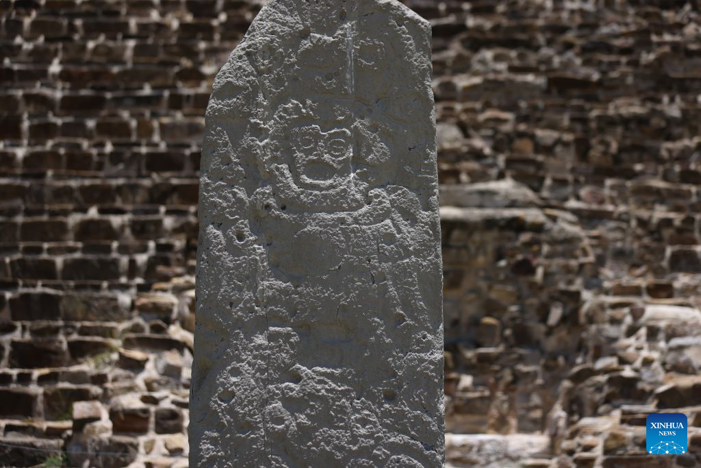 This photo taken on July 29, 2026 shows a stone carving depicting a human figure at the Monte Alban archaeological site in Oaxaca, Mexico. Built around 500 B.C., Monte Alban is located in the southern Mexican state of Oaxaca. It was inscribed on the UNESCO World Heritage List in 1987. (Xinhua/Liu Wenhui)