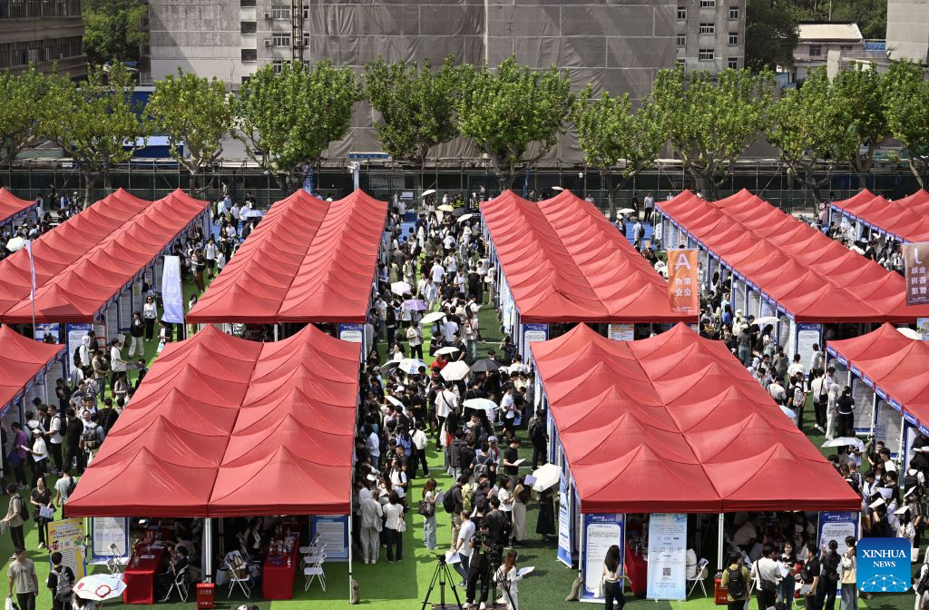This photo taken on Sept. 22, 2026 shows a scene during an autumn campus job fair for Shanghai university graduates at the East China Normal University in east China's Shanghai. The job fair kicked off here on Tuesday, with the participation of nearly 1,000 employers, covering integrated circuits, biological medicine, artificial intelligence, finance, education and other fields. (Xinhua/Liu Ying)