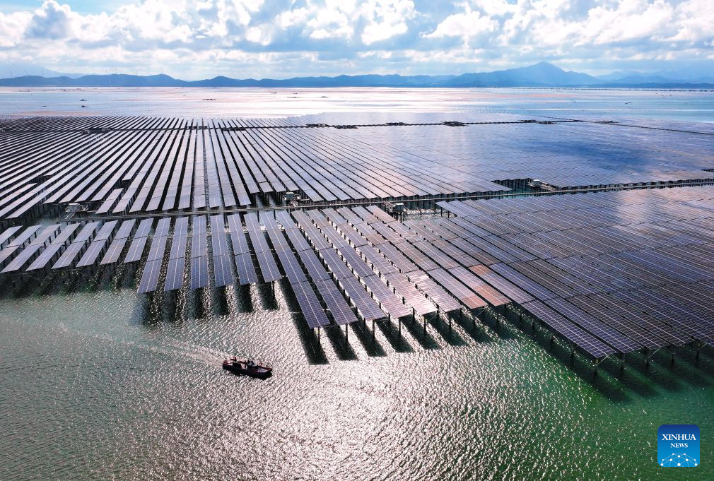 A drone photo taken on July 6, 2026 shows a view of China Three Gorges Corporation's 180 MW Dongshan Xingchen offshore solar farm in Zhangzhou City, southeast China's Fujian Province. The province of Fujian is rich in high-quality clean energy resources like wind power, solar energy, hydro power and nuclear power. In recent years, Fujian has relied on its local clean energy endowment and geographical advantages to build its smart new power grids and develop the region as a major clean energy hub in southeast China. It has accelerated the construction of power transmission channels, steadily upgraded urban and rural distribution networks, promoted the construction of smart micro-grids, continuously revitalized its clean energy advantages, and consolidated the foundation of energy security through the construction of smart new power grids. (Xinhua/Lin Shanchuan)