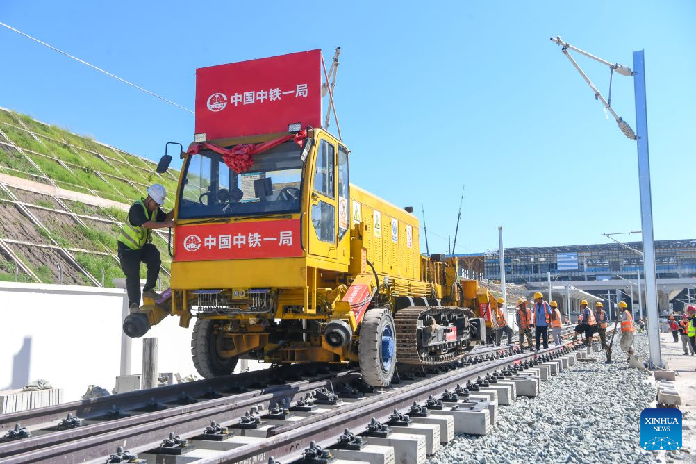 Workers lay tracks along the Chongqing-Wanzhou High-Speed Railway in Wanzhou District of Chongqing, southwest China, Sept. 1, 2026.

The Chongqing-Wanzhou High-Speed Railway completed track laying on Tuesday, paving the way for the 350 km/h line's planned opening. (Xinhua/Tang Yi)