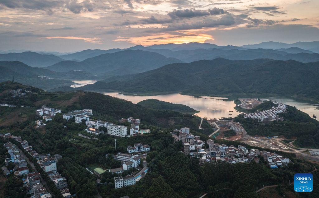 An aerial drone photo taken on Aug. 29, 2026 shows a view of Bo'ai Town of Funing County, Wenshan Zhuang and Miao Autonomous Prefecture, southwest China's Yunnan Province. Bo'ai Town in Funing County is surrounded by mountains, with rough roads and many rivers. For many years, students from nearby villages had a difficult trip to school. They either traveled on mountain roads by vehicle or crossed rivers on privately run boats to arrive at schools in the town.

Since 2021, local authorities have worked together to provide free ferry services for students. Seven water school buses now run regularly at 12 ferry crossings in the town, taking students to and from school at different time according to their school schedules.

Today, 329 students in Bo'ai Town use the ferry services. Since 2021, the service has carried students on more than 147,000 trips. (Xinhua/Wang Guansen)