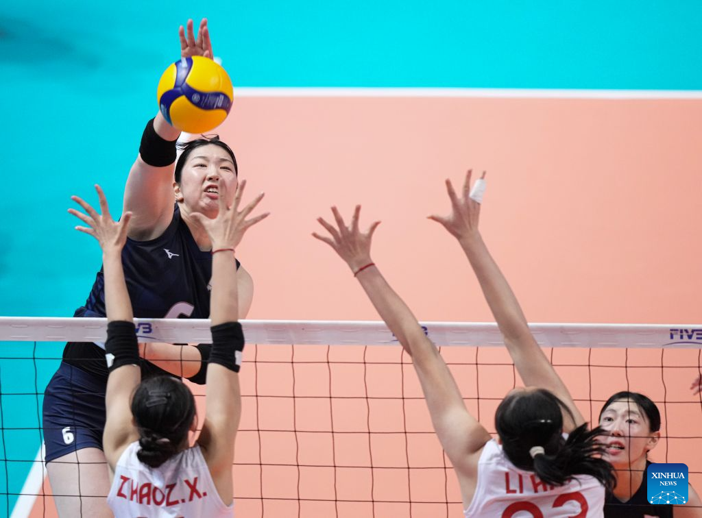 Takizawa Rino (top) of Japan spikes the ball during the final between China and Japan at the 2026 Asian Eastern Zonal Women's Volleyball Championship in Hong Kong, south China, Aug. 16, 2026. (Xinhua/Lui Siu Wai)
