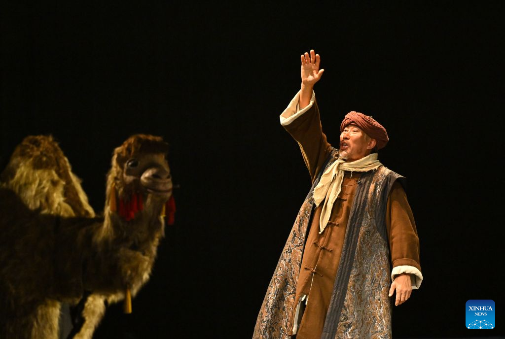 An actor performs during the seventh ethnic minority art festival in Beijing, capital of China, Aug. 18, 2026. The festival is held in Beijing from Aug. 18 to Sept. 23. (Xinhua/Han Xu)